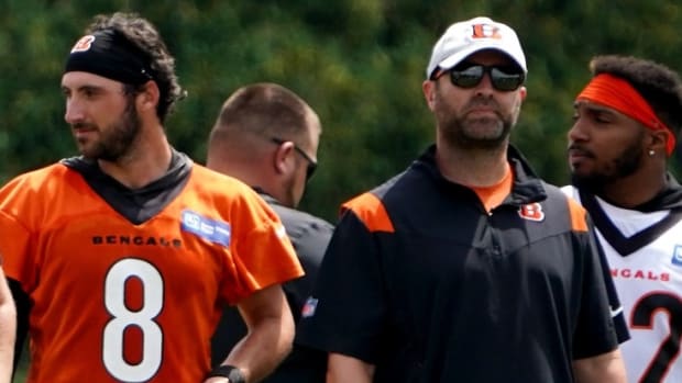 Cincinnati Bengals quarterback Brandon Allen (8) and offensive coordinator Brian Callahan watch Cincinnati Bengals training camp practice on Friday, July 29, 2022.